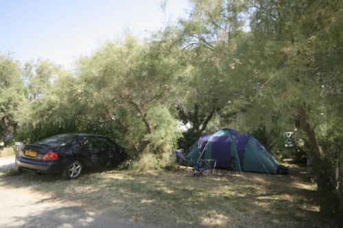 Shady campsite at the Beauséjour campground
